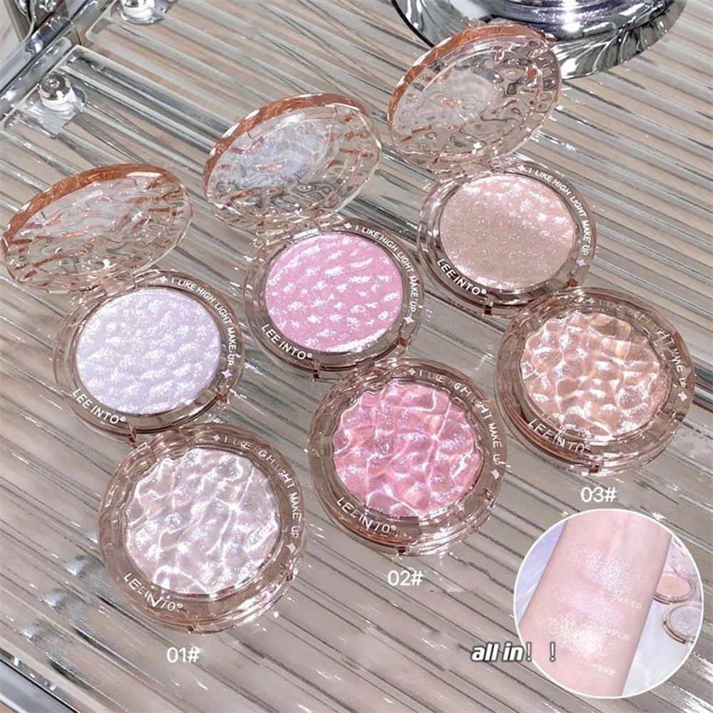 Tidesmit LEE INTO highlighter powder detail view showing pearlescent finish and silky shimmer face makeup texture