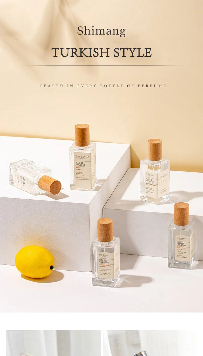 Shimang woody fruity tea EDP perfume for women. Luxury 50ml square glass bottle with wooden cap. Long-lasting scent.