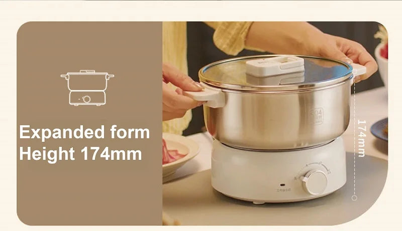 Compact electric cooking pot with stainless bowl, glass lid, and white control knob