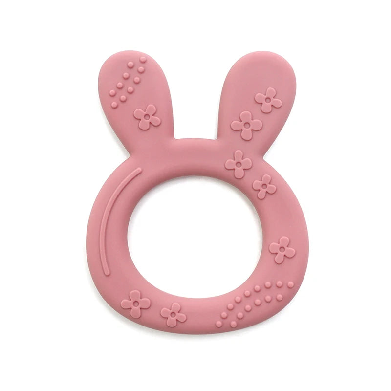 Pink silicone bunny baby teething ring for soothing relief.