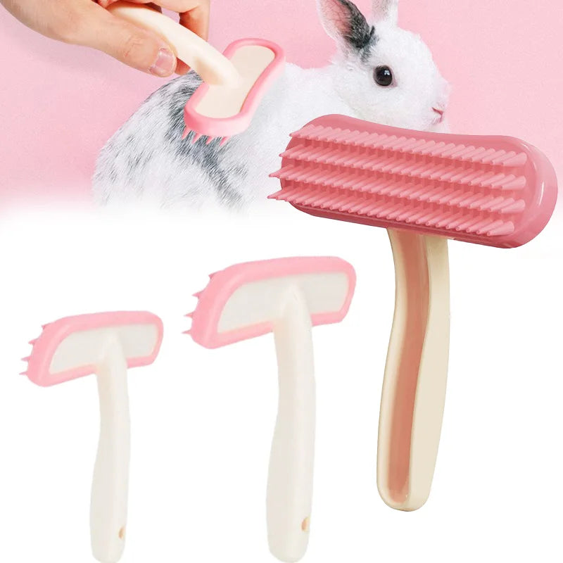 Pink silicone rabbit and small pet grooming comb for gentle hair removal and detangling.
