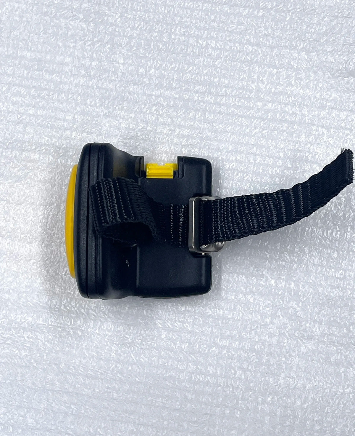 Black scan trigger assembly with yellow side cap and metal strap clip