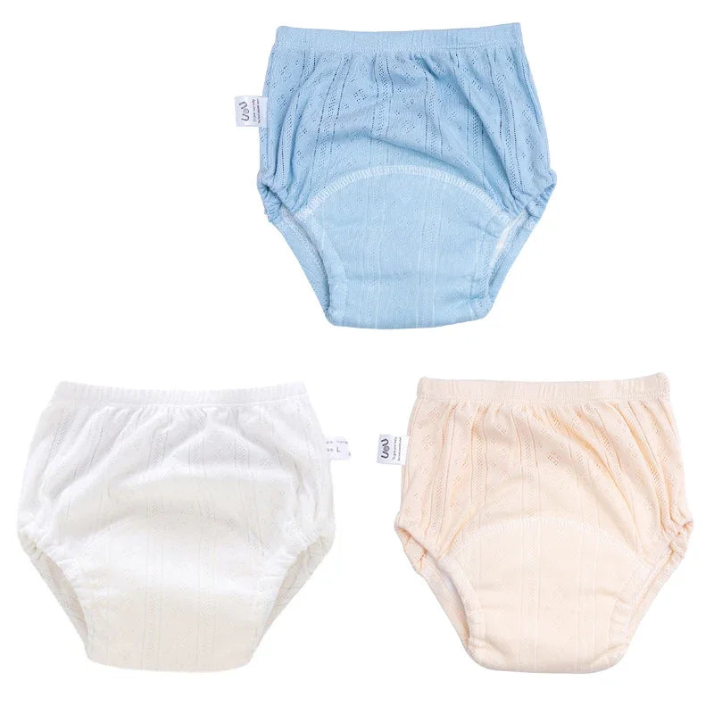 3-pack UOU baby training pants, size L. Breathable, cotton-like reusable absorbent diaper underwear in soft pastels.