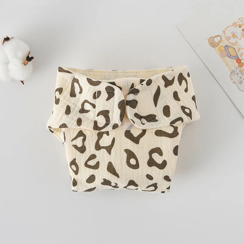 Leopard print baby cloth diaper cover with adjustable hook-and-loop fasteners for soft baby care.