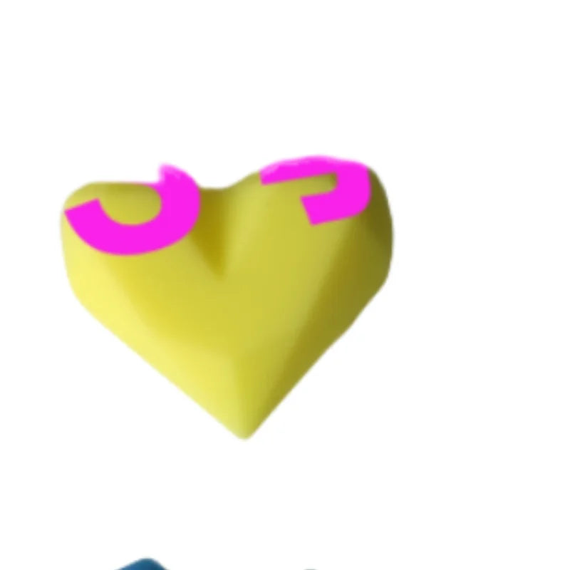Yellow heart-shaped silicone dust plug for Tamagotchi Uni, protecting your electronic pet port from dirt and debris.
