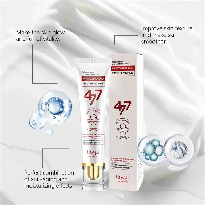Hoygi 47 whitening and spot-removing cream tube and box on a white cream background with blue water bubble graphics.