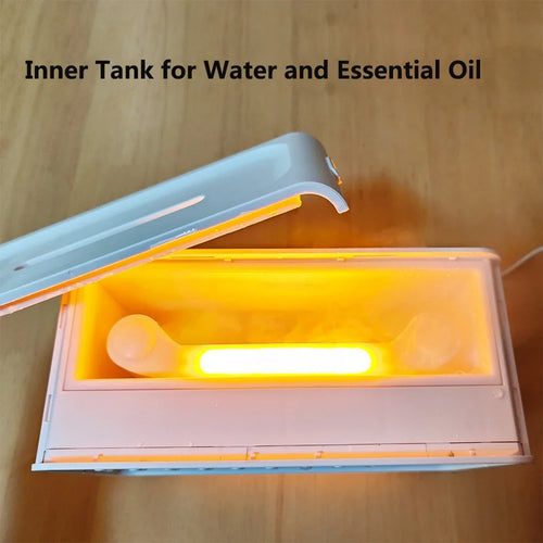 White sleep aid machine with open white tank and glowing orange light for relaxing rest.
