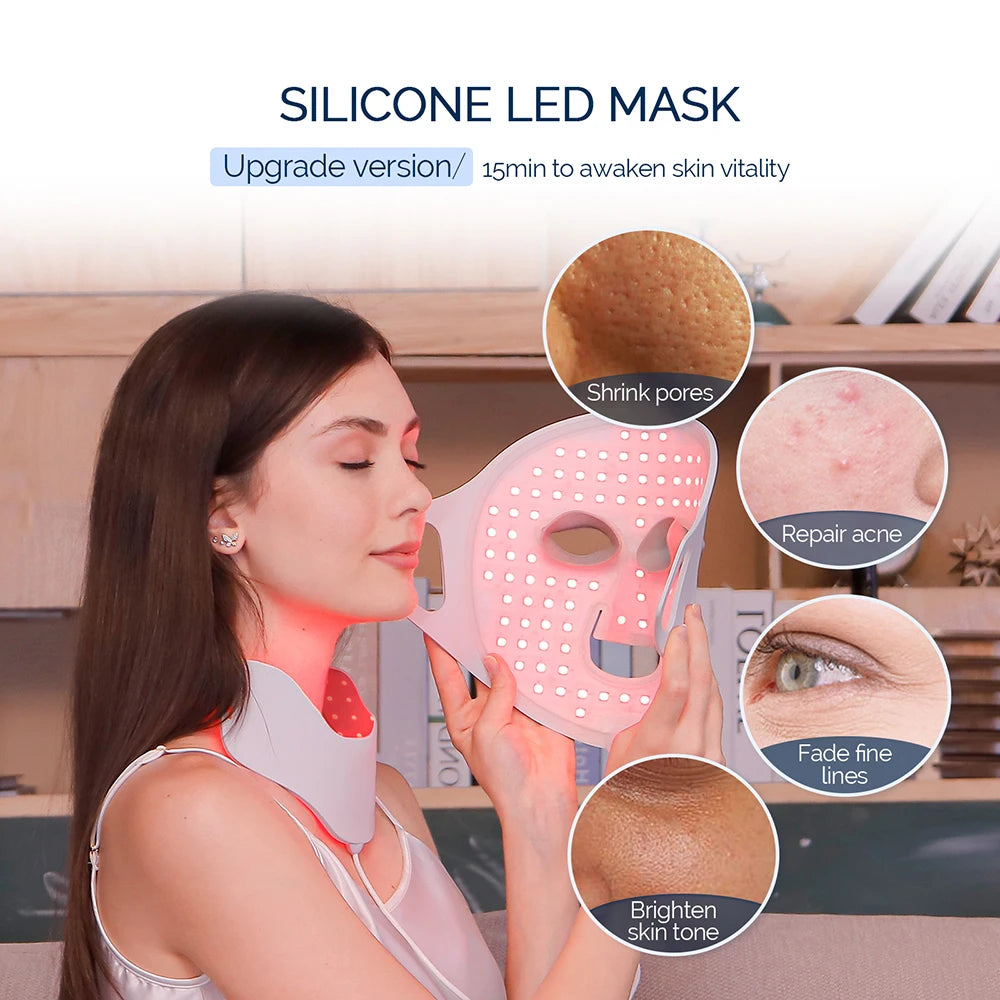 A woman holds a flexible, white silicone LED light therapy mask for the face and neck, emitting a red glow.