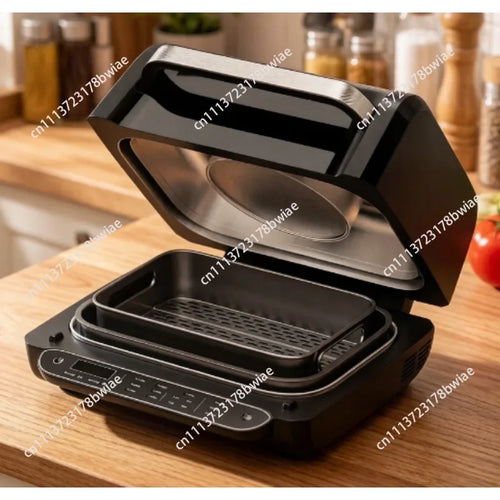 Black indoor smokeless grill air fryer with open lid and cooking tray