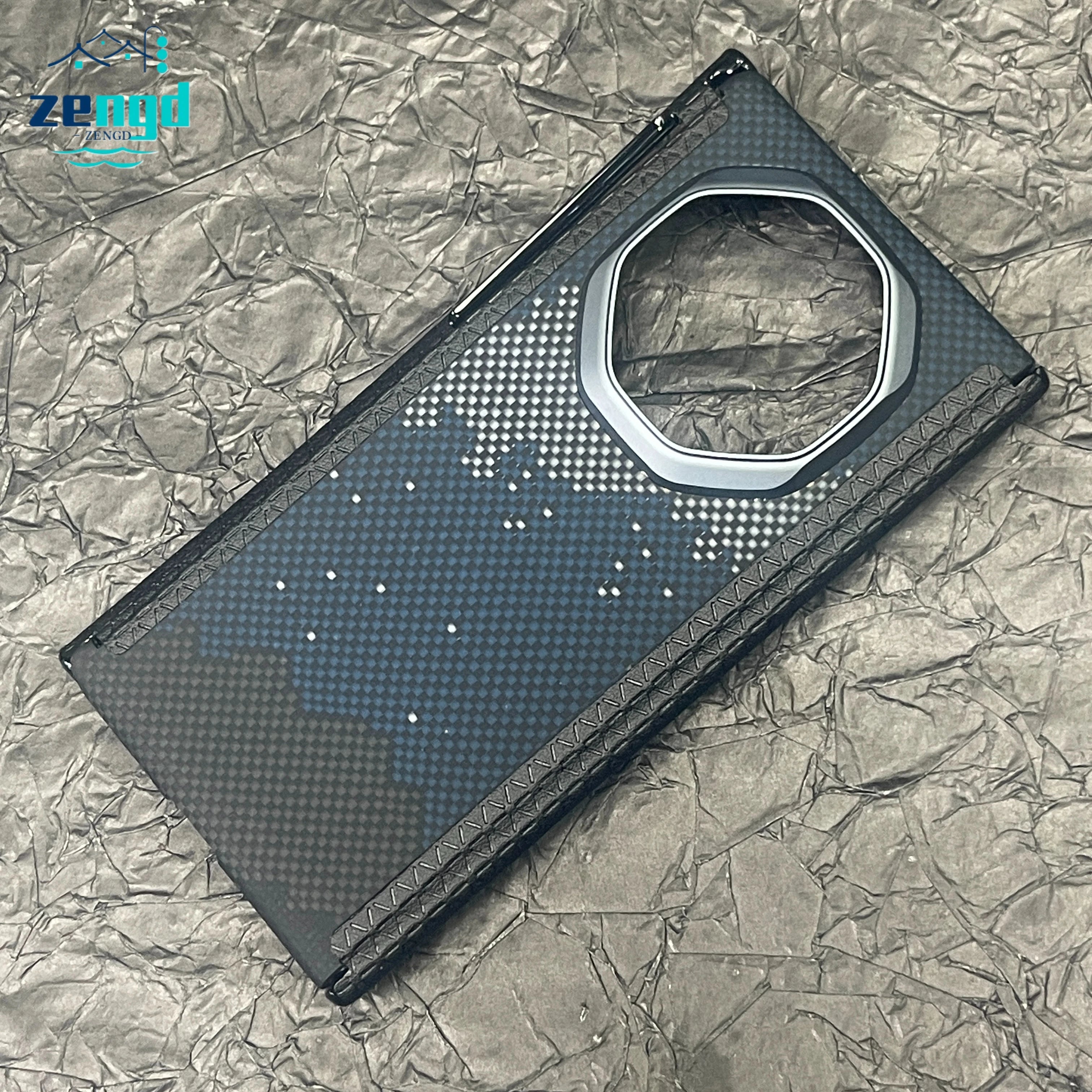 Carbon fiber phone case with blue checkered pattern, textured grip edges, and a large octagonal camera cutout.