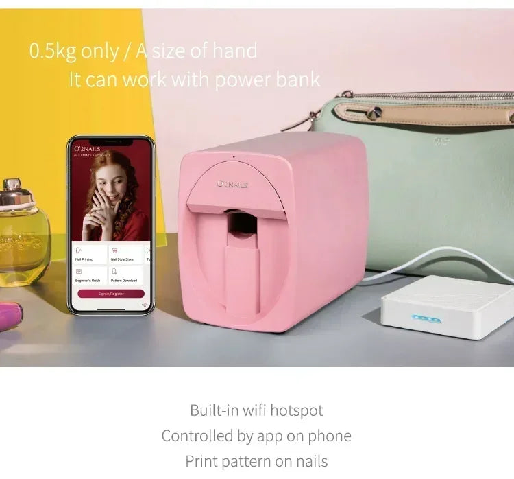 Pink portable smart nail printer 3D mobile painting machine with WiFi app control and power bank compatibility.