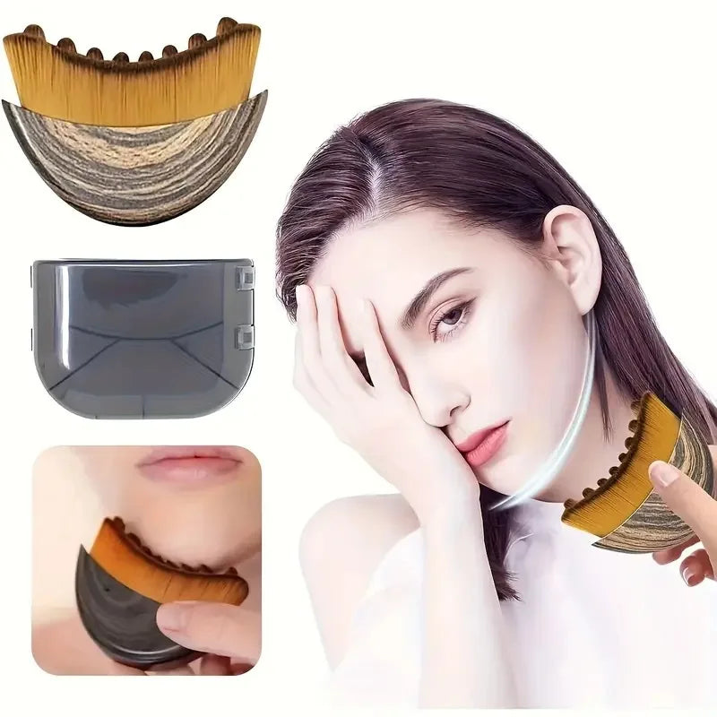 Curved, wood-patterned face contouring brush with soft bristles, shown in use on a jawline with a protective case.