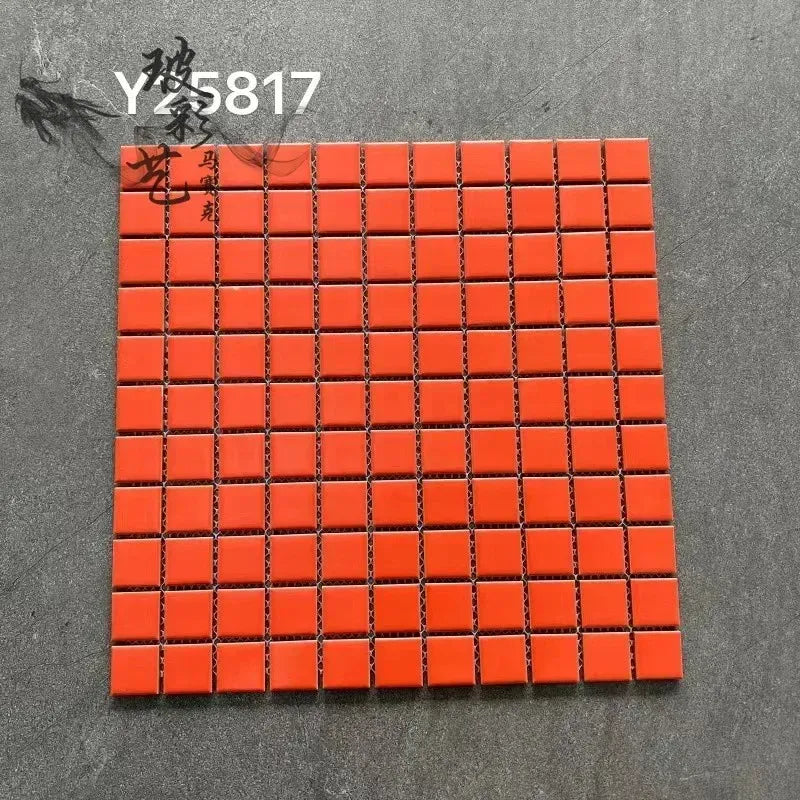 Ceramic mosaic wall tiles sheet with glossy orange squares and dark grout lines