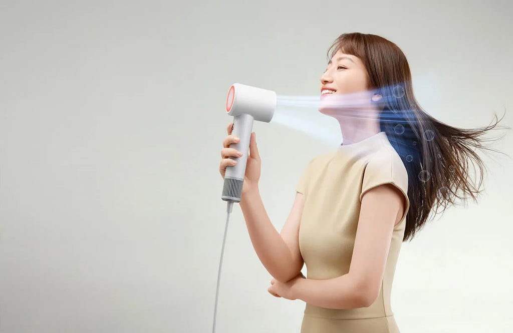 MIJIA H501 SE white high-speed ionic hair dryer blowing air through hair for fast, professional salon-style drying.
