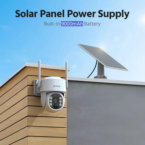 Outdoor white wireless solar security camera mounted on a wooden wall with a solar panel.