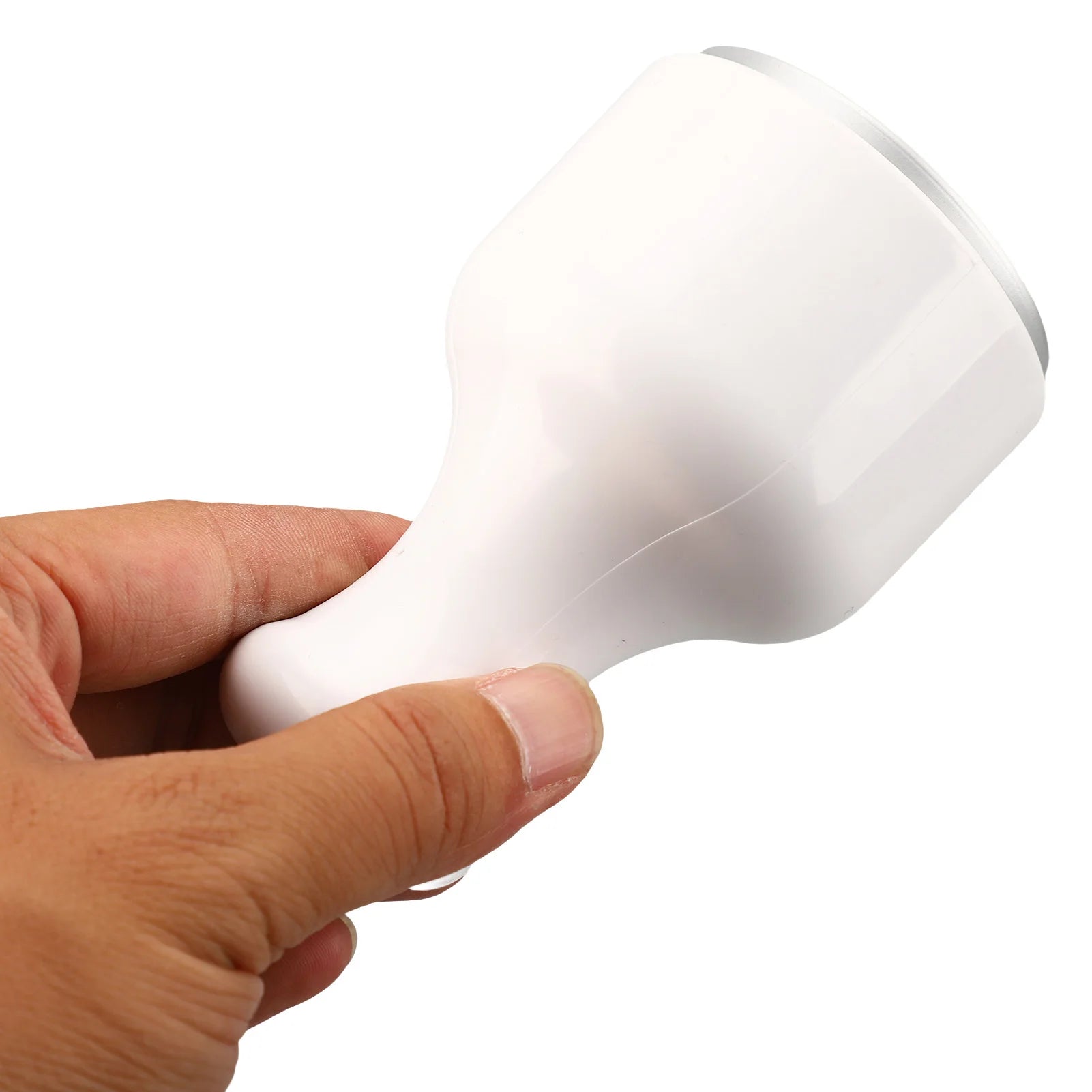 Hand holding a white, bell-shaped ice facial roller with a smooth plastic handle and a flat circular metal face.
