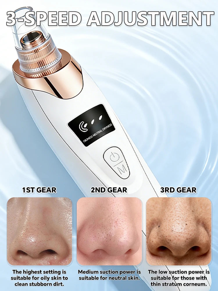 White and gold electric blackhead vacuum remover with 3-speed LED display for pore cleaning and facial skin care.