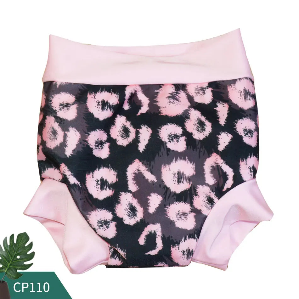 Reusable swim diaper in pink leopard print with ruffle trim, baby care essential model CP110.