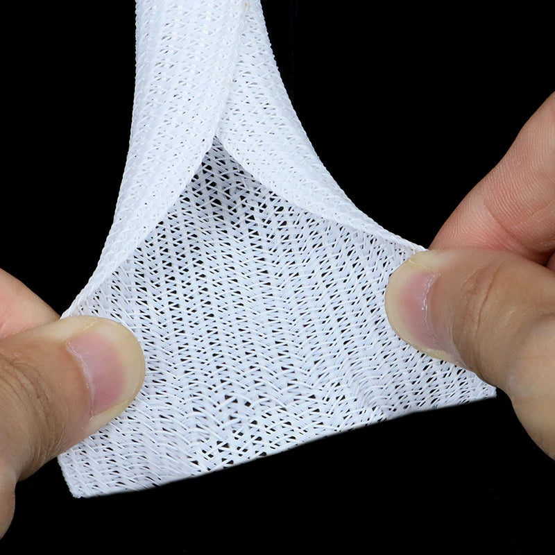White self-closing PET cable sleeve for wire protection. Heat-resistant, split-braided design to prevent pet chewing.