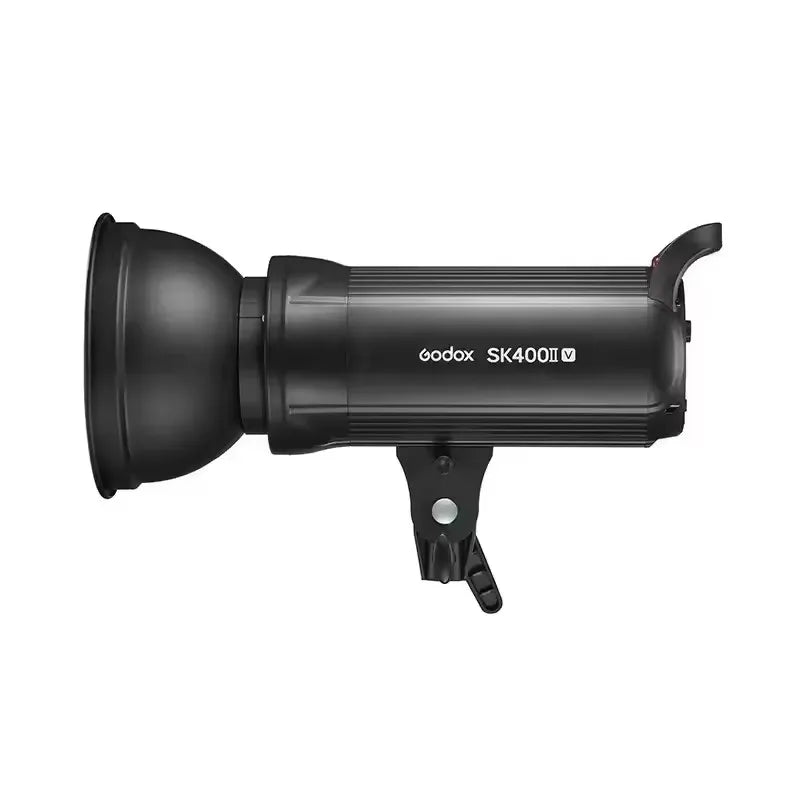 SK400II studio strobe light in black, cylindrical metal housing with an attached reflector bowl for photography.