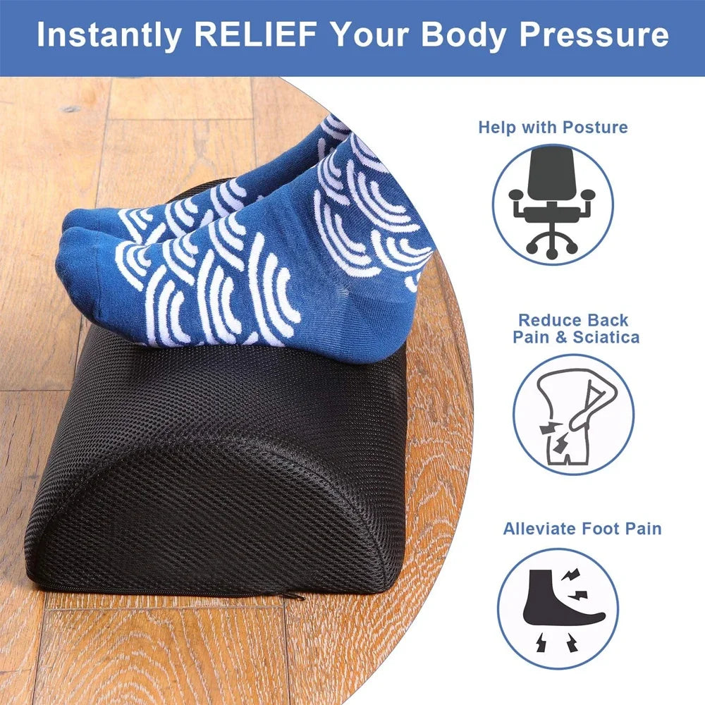 Ergonomic black memory foam foot rest for under desk with non-slip base for posture support and pain relief.