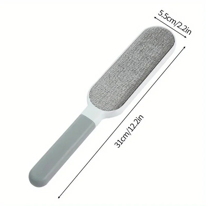 Reusable double-sided pet hair remover brush for clothing, sofas, and carpets. Durable gray 31cm cleaning tool.