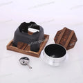 Portable smart multi-cooker with black body, silver inner pot, and wood stand base