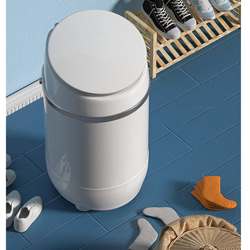 Tidesmit automatic mini sneaker washing machine showing cleaning cycle and internal drainage for small footwear