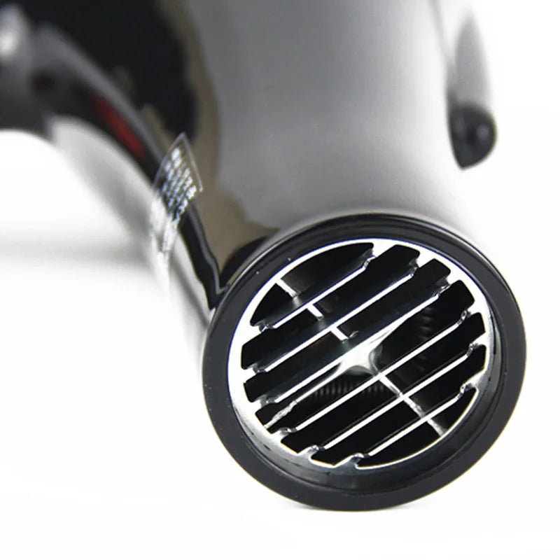 Glossy black 2100W professional salon hair dryer nozzle detail for fast drying and precision styling.