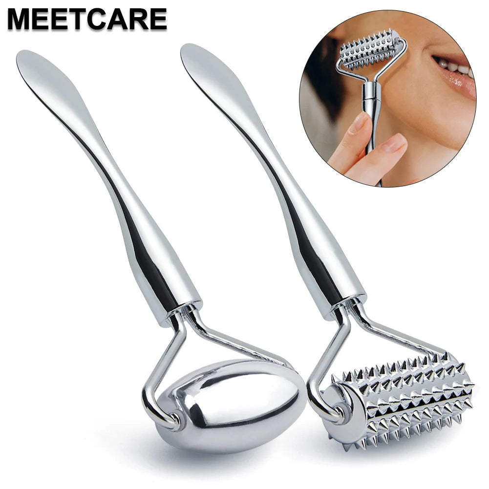 Two silver zinc alloy face rollers: one smooth, one spiked, featuring a spatula handle. Includes a person using one.