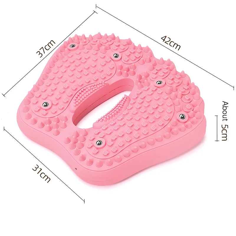 Pink, foot-shaped, inflatable acupoint massage mat with spikes and embedded magnetic stones, labeled with dimensions.