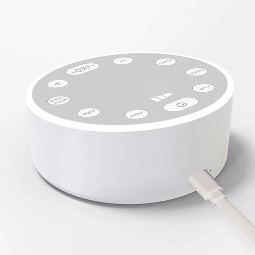 White circular sleep aid machine with sound selection buttons, light controls, and plug-in power for deep sleep.