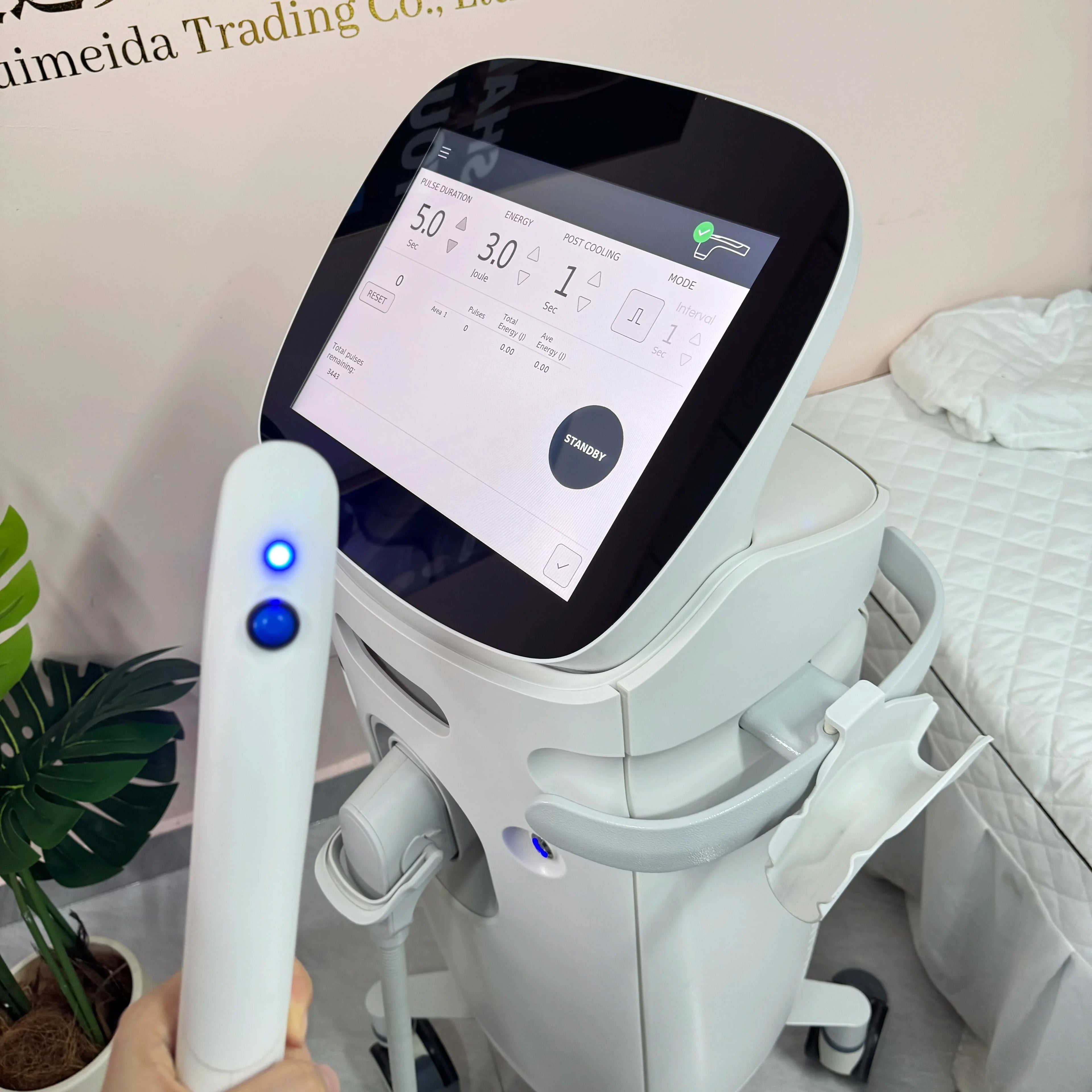 Professional HIFU facial lifting and skin tightening machine with touchscreen display and handheld applicator.