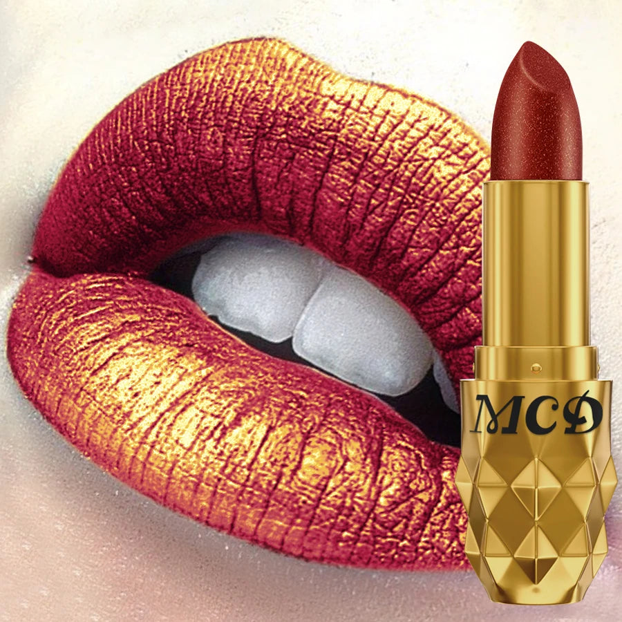 Intense pearlescent metallic lipstick in a gold-flecked red shade with a glittery, long-lasting matte finish.