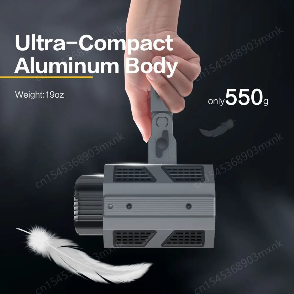 Handheld 550g gray aluminum LED video light with a compact, rectangular vented body and top handle.