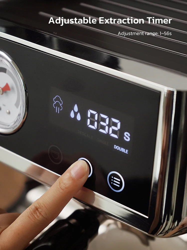 Finger pressing digital extraction timer on black and chrome professional espresso coffee machine.
