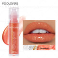 Grapefruit shimmering moisturizing lip gloss in a roll-on tube for a long-lasting, natural makeup look.