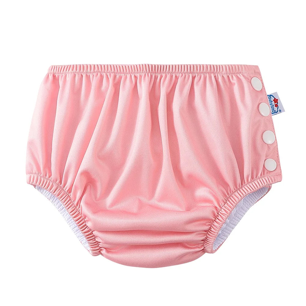 Babyland reusable pink cloth baby diaper with adjustable side snaps for infants.