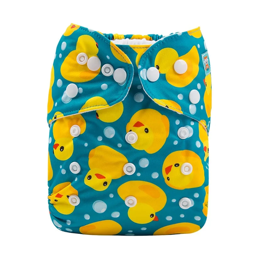 Reusable baby cloth diaper in teal with yellow rubber duck and bubble print pattern, featuring adjustable snap closures.