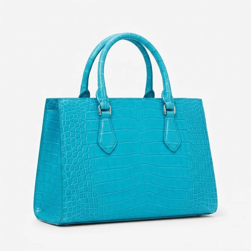 Luxury turquoise genuine leather handbag with vintage alligator embossed design and classic dual top handles.