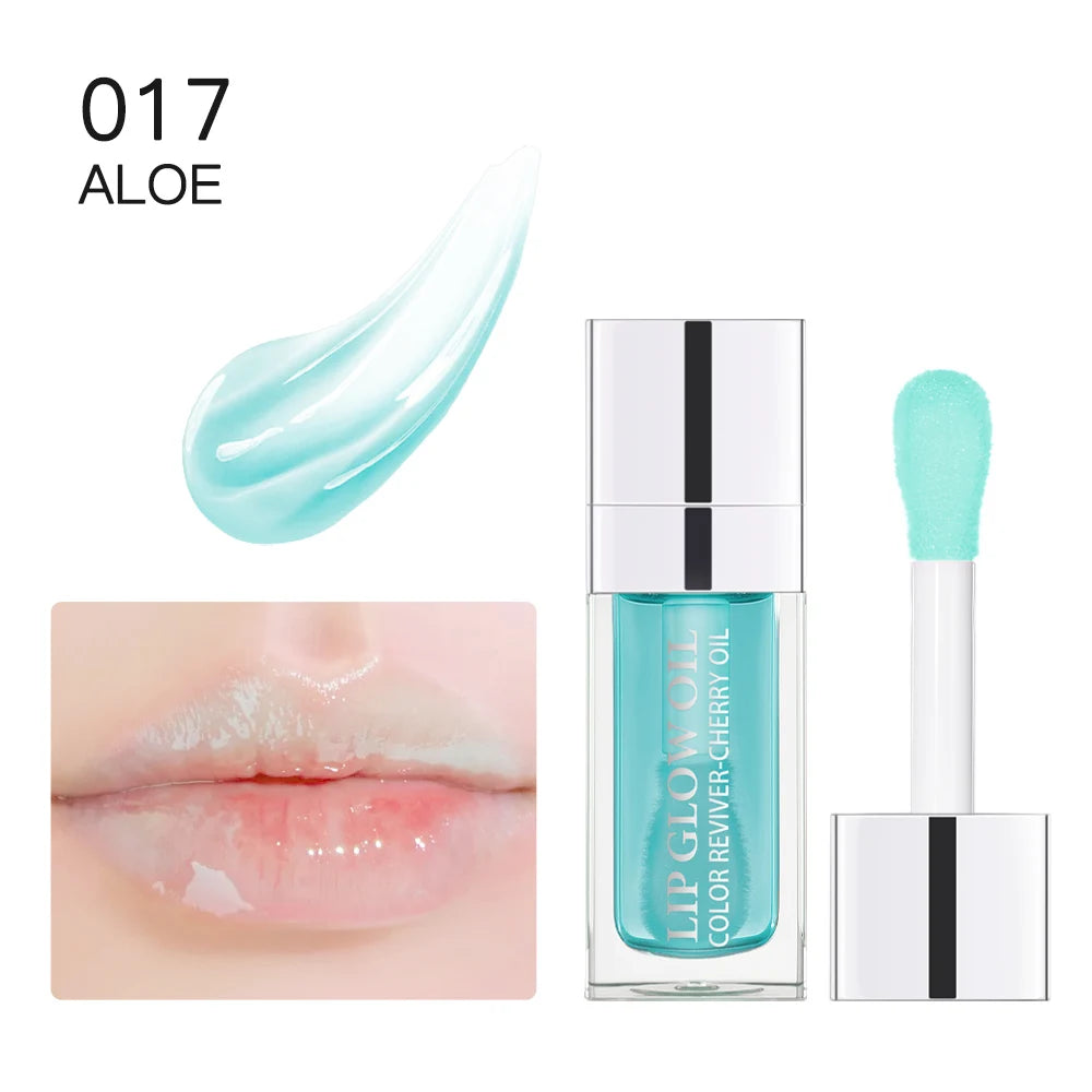 Aloe crystal jelly lip oil with applicator, clear hydrating plumping lip gloss texture for glossy, moisturized lips.