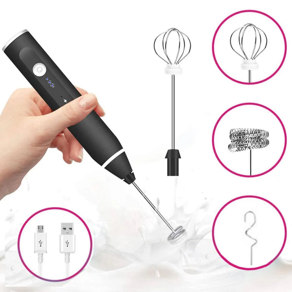 Handheld black electric milk frother with stainless steel whisk attachments and USB charging cable for coffee.