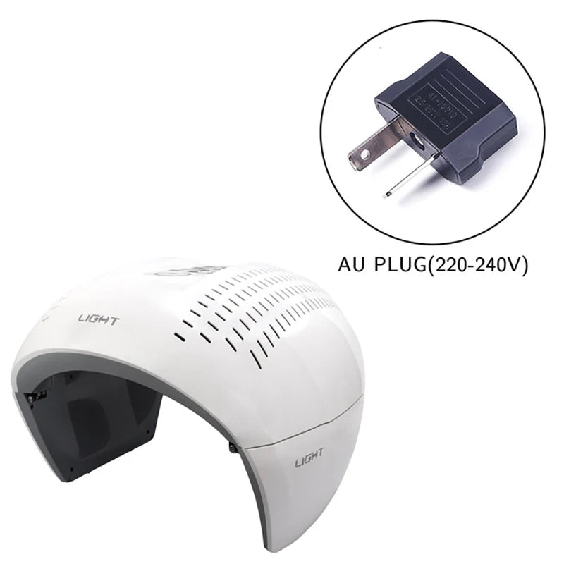 White, dome-shaped LED nail lamp with ventilation slits and a black Australian power plug adapter.