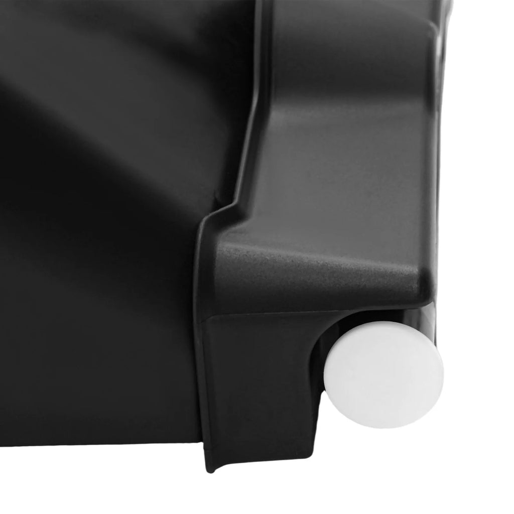Close-up of black planter corner with white round mounting spacer