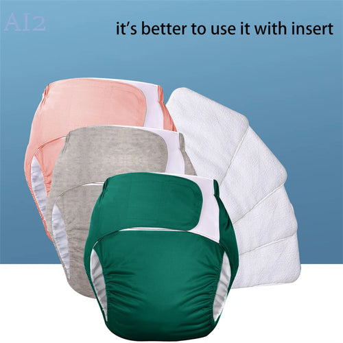 Reusable cloth diaper covers in assorted colors with absorbent white inserts for baby care.