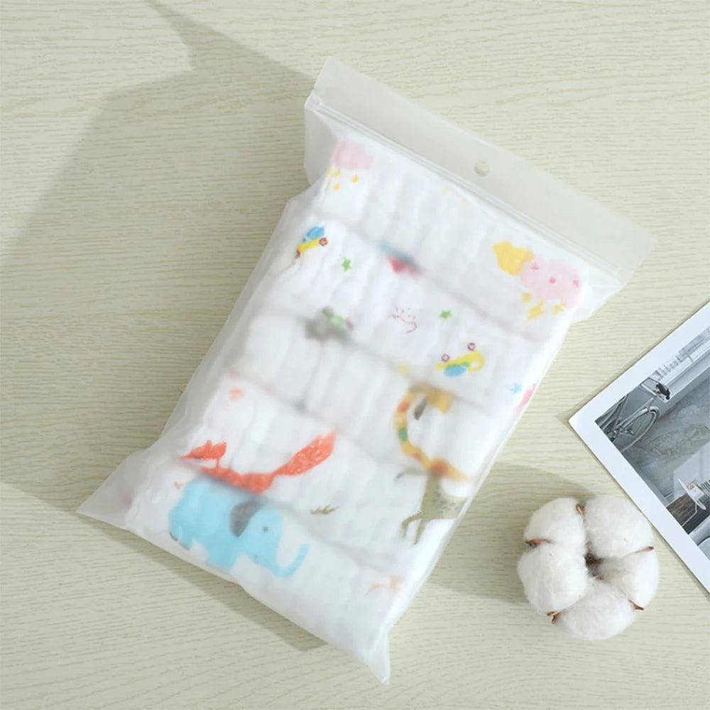 Pack of 5 soft cotton baby muslin washcloths with cute animal prints, perfect for baby care.
