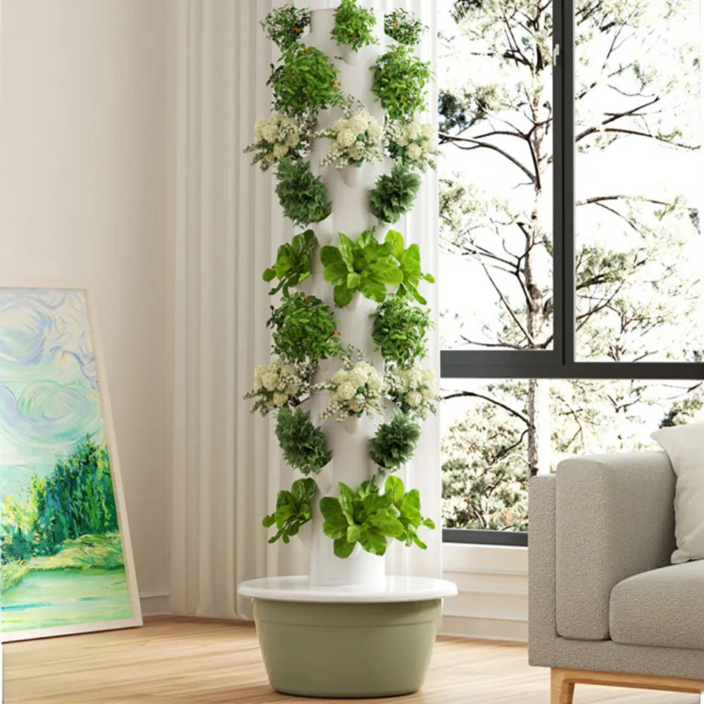 Vertical aeroponic tower garden with cascading herbs in white openings and basin