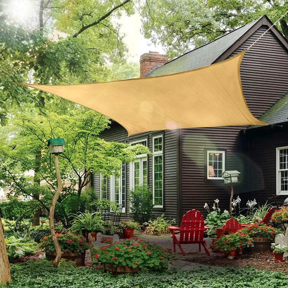 Beige waterproof sun shade sail canopy with curved edges and corner attachment rings