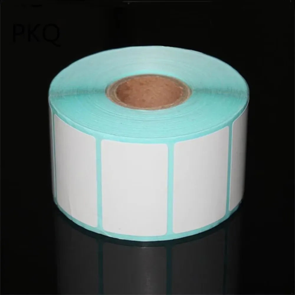 Thermal label sticker roll with white label areas on teal backing
