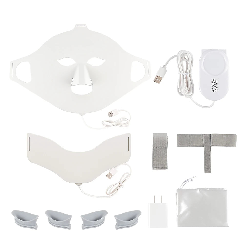 White silicone LED face and neck mask kit with controller, charging cables, straps, eye protectors, and a storage bag.